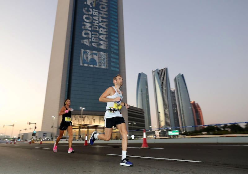 Abu Dhabi, United Arab Emirates - December 06, 2019: Athletes take part in the ADNOC Abu Dhabi marathon 2019. Friday, December 6th, 2019. Abu Dhabi. Chris Whiteoak / The National