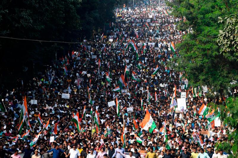 Supporters and activists of Trinamool Congress (TMC) participate in a mass rally in Kolkata. AFP