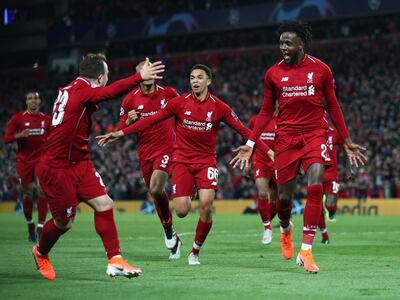 LIVERPOOL, ENGLAND - MAY 07:  Divock Origi of Liverpool (27) celebrates as he scores his team's fourth goal with team mates during the UEFA Champions League Semi Final second leg match between Liverpool and Barcelona at Anfield on May 07, 2019 in Liverpool, England. (Photo by Clive Brunskill/Getty Images)