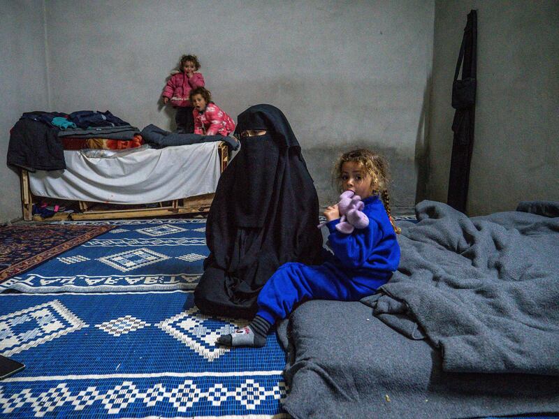 A woman released from Al Hol camp with her children under tribal agreements says she has not been accepted by Syrian communities who accuse her of association with ISIS. Luke Pierce for The National