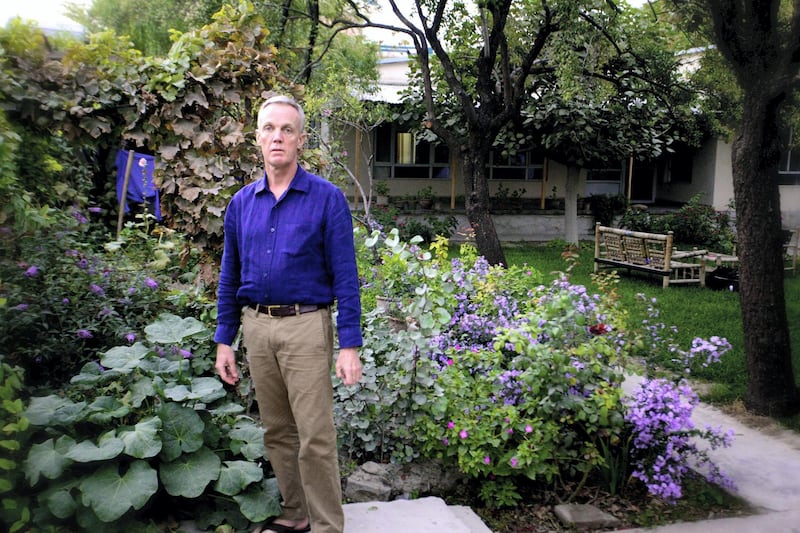 South African Architect Jolyon Leslie in his garden in Kabul. Leslie has lived in Kabul since 1989. ‘Most of the Taliban came from rural areas and were complete softies when it came to flowers. I remember waiting for a flight from Kabul when they were in power. They had their own private garden at the airport and were far more interested in polishing the rose leaves than checking I had the right papers to be there and travel around.

There is something very special about the climate here. Things just grow. I came to the garden, he tried to plant indigenously. Roses are native to Central Asia and grow like weeds here but a lot of them now have been over-bred, over-cultivated and are too ornamental. I added to this the buddleia, hollyhocks, pomegranate, fig and Judas tree along with a Russian olive: a species of elaeagnus native to both Central Asia and southern Russia which thrives in poor soil. It drives the Afghans mad that it is still referred to as Russian and not yet Afghan.’ 

