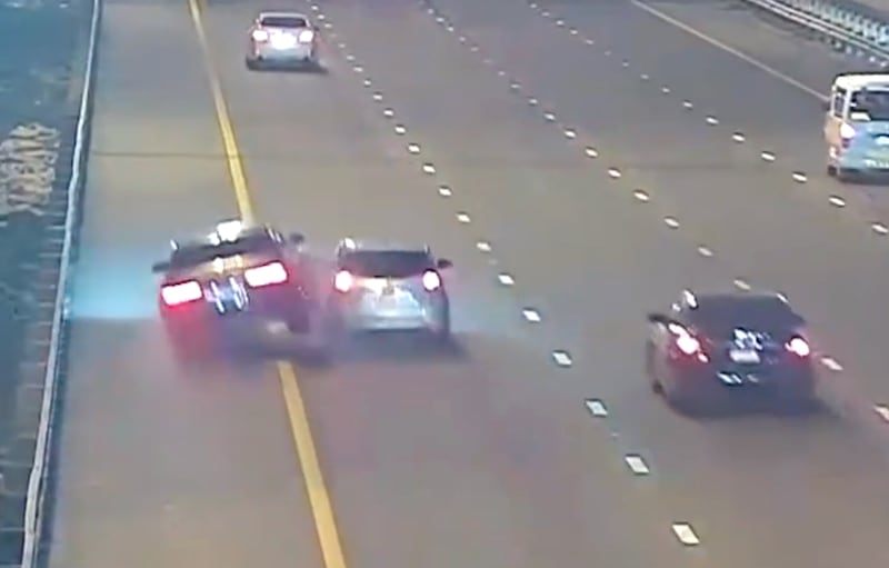 The video shows a car tailgating another on a four-lane highway in the emirate. Screengrab