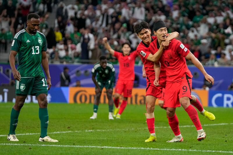 South Korea's Cho Gue-Sung, front, celebrates with teammates after scoring his side's late equaliser to make it 1-1. AP