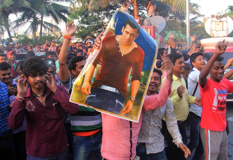 MUMBAI, INDIA - DECEMBER 10: Fans celebrate, burst crackers and distribute sweets outside Bollywood actor Salman Khan's residence at Bandra after he was acquitted in 2002 hit-and-run case, on December 10, 2015 in Mumbai, India. Salman Khan broke down as the judge pronounced the order acquitting him of all the charges in the 2002 hit-and-run case. On September 28, 2002, the actor���s car allegedly rammed into a shop in suburban Bandra. In the mishap, one person was killed and four others were injured. The court said there was not enough evidence to prove that Khan was drunk or driving his car when it rammed into the pavement in suburban Bandra on September 28, 2002, killing one person and injuring four others. The prosecution later said it will go in appeal. But troubles for Salman are not over completely as there are chances that the prosecution may question the High court���s decision in the Supreme Court. (Photo by Pramod Thakur/Hindustan Times via Getty Images)