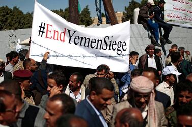 Yemenis take part in a protest calling for the reopening of Sanaa airport to receive medical aid in front of the UN offices in Sanaa, Yemen. AP