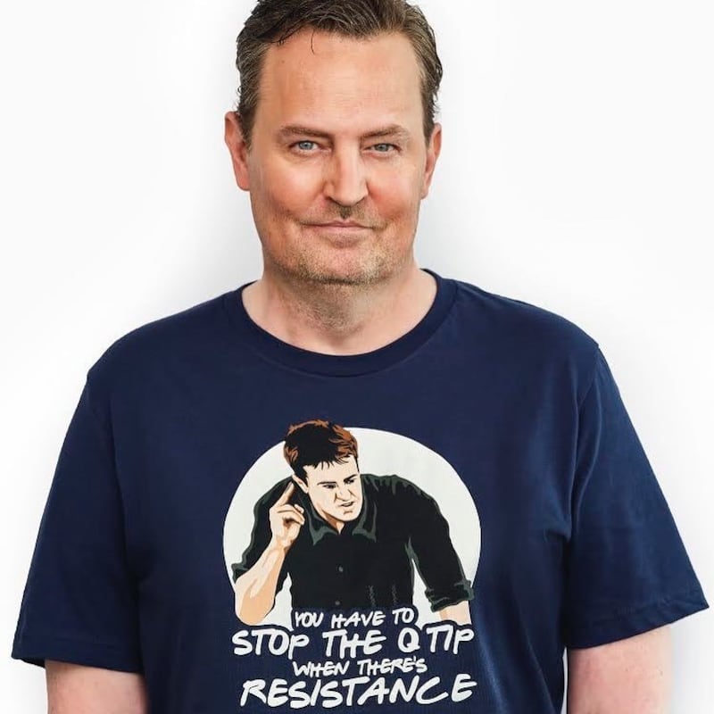 Matthew Perry, who played Chandler in 'Friends', wears a 'Stop the Q-tip when there's resistance' T-shirt from the limited edition Cast Collection of merchandise