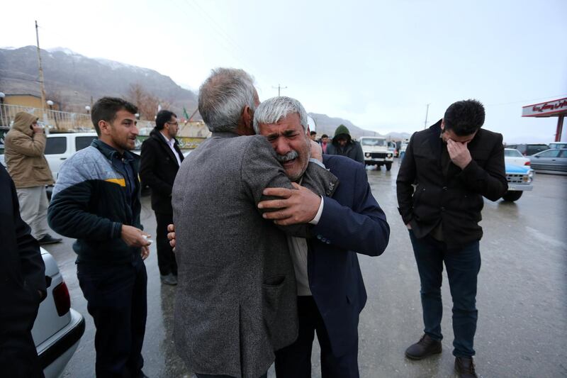 Relatives of passengers who were believed to have been killed in a plane crash react near the town of Semirom, Iran, February 18, 2017. REUTERS/Tasnim News Agency  ATTENTION EDITORS - THIS PICTURE WAS PROVIDED BY A THIRD PARTY.     TPX IMAGES OF THE DAY