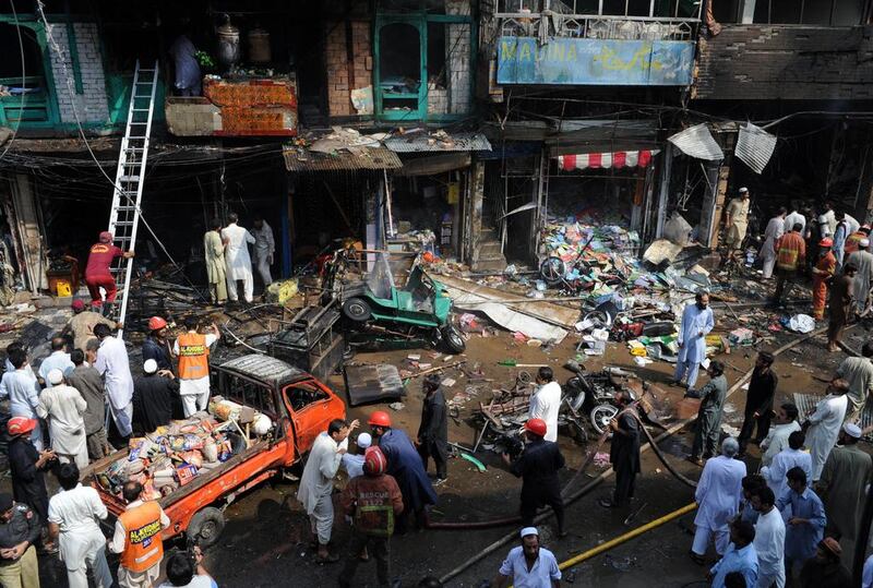 A bomb explosion killed at least 33 people in Pakistan's northwestern city of Peshawar, officials say.  A Majeed / AFP Photo