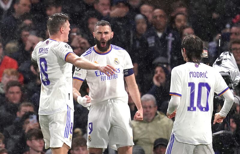 Real Madrid's Karim Benzema celebrates scoring the opening goal. PA