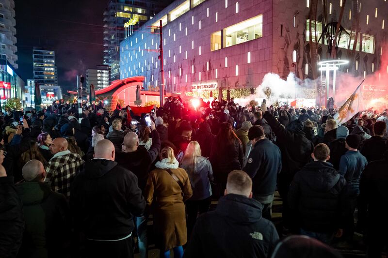 Hundreds of demonstrators gather to protest against the tightened coronavirus measures. EPA