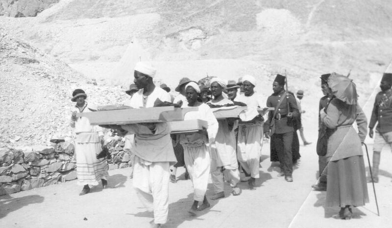 February 1923:  Bearers remove objects from the tomb of King Tutankhamen in the Valley of the Kings near Luxor.  (Photo by Hulton Archive/Getty Images)