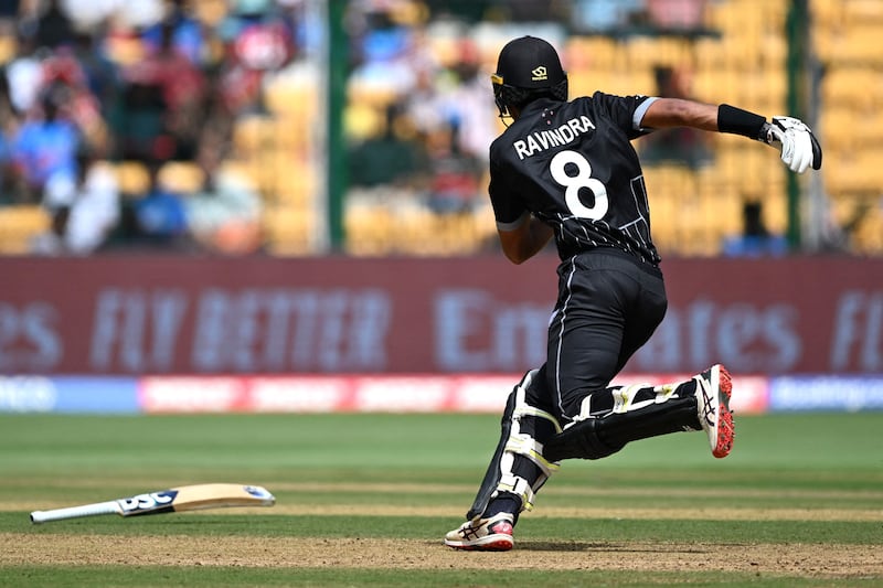 New Zealand's Rachin Ravindra loses his bat after playing a shot. AFP
