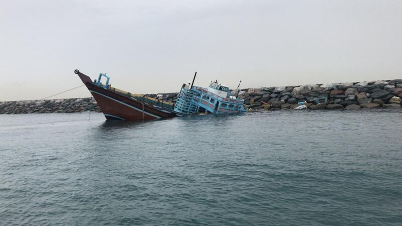 Seven sailors were rescued after their stricken vessel capsized during fierce weather conditions in Dubai on Sunday. 