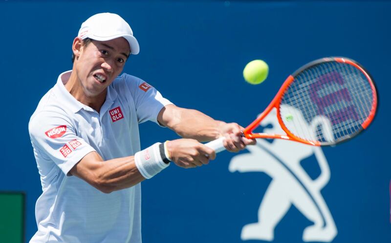 Kei Nishikori, of Japan, returns to Gael Monfils, of France, during second round of play at the Rogers Cup tennis tournament, Wednesday, Aug. 9, 2017 in Montreal. (Paul Chiasson/The Canadian Press via AP)