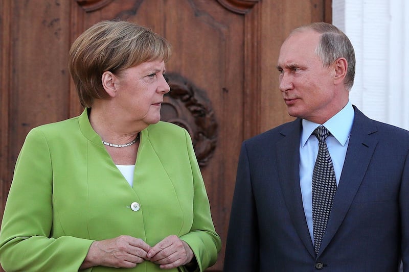 Angela Merkel speaks with Vladimir Putin during a bilateral meeting at Schloss Meseberg castle in Meseburg, Germany, August 18, 2018. Bloomberg