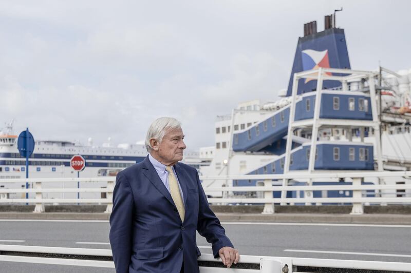 Jean-Marc Puissesseau, chief executive officer of the Port of Calais, poses for a photograph near a cross channel ferry, operated by P&O Ferries Ltd., at the seaport terminal in the Port of Calais in Calais, France, on Monday, Oct. 7, 2019. The port of Calais on France’s northern coast has spent 6 million euros ($6.6 million) on facilities for customs officers, updated signage around freshly painted roads and huge extra parking lots for trucks. Photographer: Marlene Awaad/Bloomberg