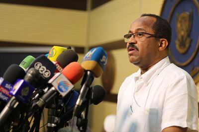 Sudanese Health Minister Akram Ali Al-Tom speaks during a press conference in Khartoum, Sudan, Friday, March. 13, 2020. Sudan reported its first case of the coronavirus , a person who had already died. (AP Photo/Marwan Ali)