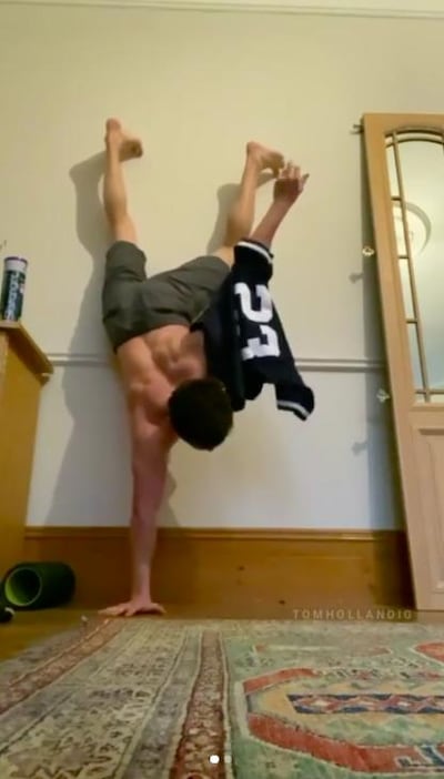 Marvel actor Tom Holland mid-handstand challenge. Instagram 