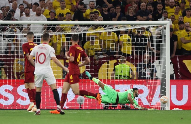 Sevilla's Ivan Rakitic hits the post as Roma's Rui Patricio dives. Reuters