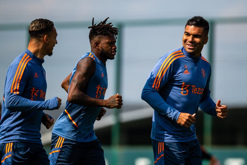 Antony, Fred, and Casemiro during Manchester United's training session in Carrington. Getty