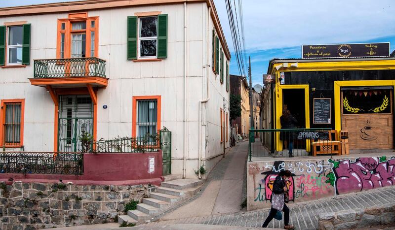 Amid the hills of Valparaiso, residents need to walk up and down steep hills and steps every day now that the city's elevators have been turned off due to a lack of tourists. AFP