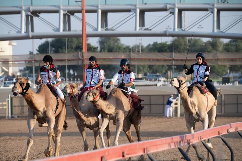 Khawla Al Blooshi (far right) during the camel race in Dubai. Photo: Hamdan Bin Mohammed Heritage Centre