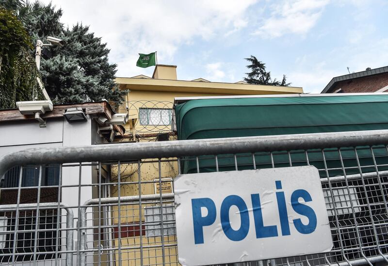 This picture shows the backyard of the Saudi Arabian consulate behind a police sign on October 11, 2018 in Istanbul.  Jamal Khashoggi, a Saudi Washington Post contributor, vanished on October 2 after entering the consulate to obtain official documents ahead of his marriage to his Turkish fiancee. Government sources said at the weekend that police believed Khashoggi was killed by a team specially sent to Istanbul, thought to consist of 15 Saudis. 
Turkish President Recep Tayyip Erdogan urged Saudi Arabia to release footage of Jamal Khashoggi and President Donald Trump demanded answers over his fate, as the kingdom faced growing pressure on October 11, 2018 to provide a convincing explanation for his disappearance.  / AFP / OZAN KOSE
