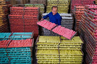 A worker producing chalks at a workshop in Yingcheng, Xiaogan city, in China's central Hubei province this week. AFP