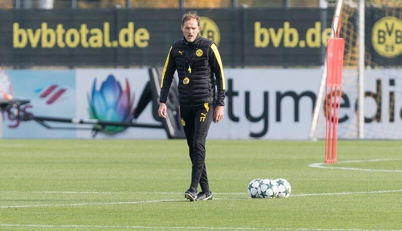 Borussia Dortmund manager Thomas Tuchel observes training. Guido Kirchner / DPA / AFP