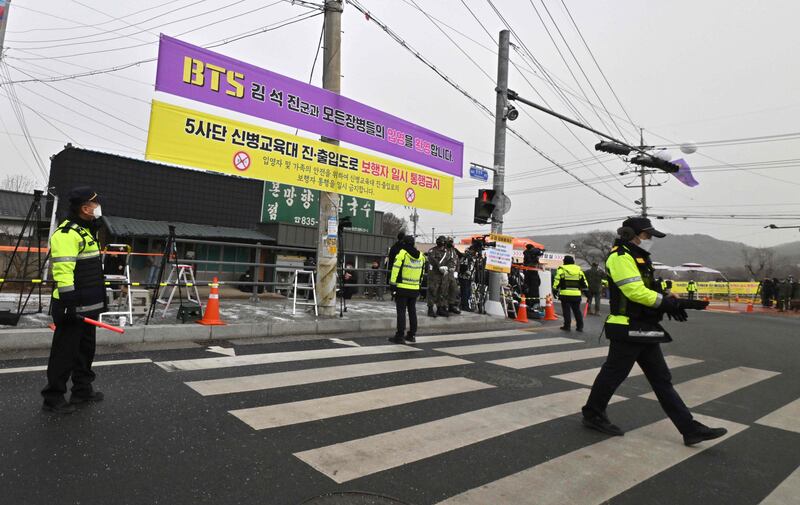 A banner welcoming Jin. AFP