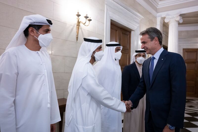 Sheikh Mohammed bin Hamad, Adviser for Special Affairs at the Presidential Court, is received by Mr Mitsotakis alongside Ali Al Shamsi, deputy secretary general of the Supreme National Security Council (L); Sheikh Zayed bin Mohamed (3rd L) and Sheikh Mansour bin Zayed, Deputy Prime Minister and Minister of Presidential Affairs (4th L). 
