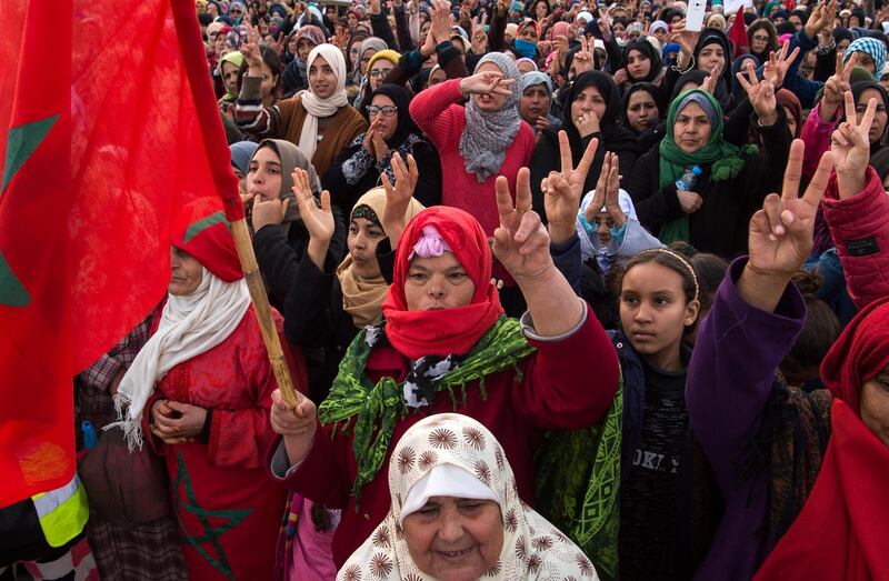 Moroccan women shout slogans during a demonstration against economic marginalisation on January 20, 2018, in the northeastern city of Jerada, 60 kilometres southwest of Oujda.
The residents of the former mining town demonstrated to call for "jobs and development" after the accidental death of two brothers in a disused mine sparked mass protests. / AFP PHOTO / FADEL SENNA