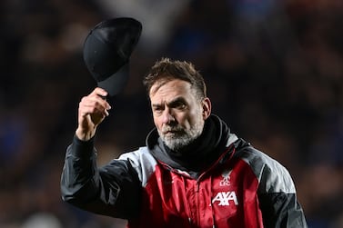 BERGAMO, ITALY - APRIL 18: Jurgen Klopp, Manager of Liverpool, acknowledges the fans by taking his cap off following his side's elimination from the UEFA Europa League after the UEFA Europa League 2023/24 Quarter-Final second leg match between Atalanta and Liverpool FC at Stadio Atleti Azzurri d'Italia on April 18, 2024 in Bergamo, Italy. (Photo by Dan Mullan / Getty Images)