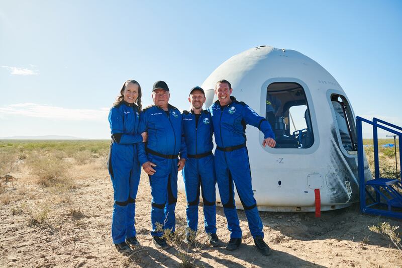 Blue Origin's New Shepard team members pose after touching down in the desert outside of Van Horn, Texas. Photo: Blue Origin