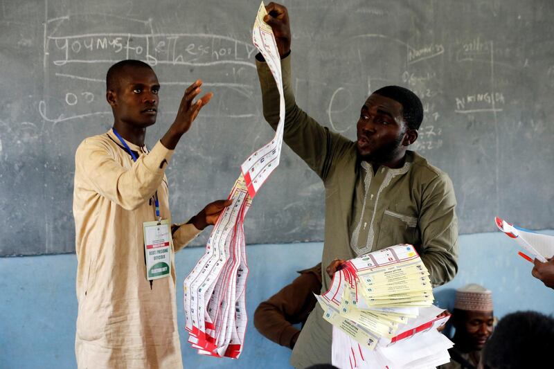 INEC adhoc workers count ballot papers during sorting at Giginyu Primary School in Kano State, Nigeria February 23, 2019.REUTERS/Afolabi Sotunde