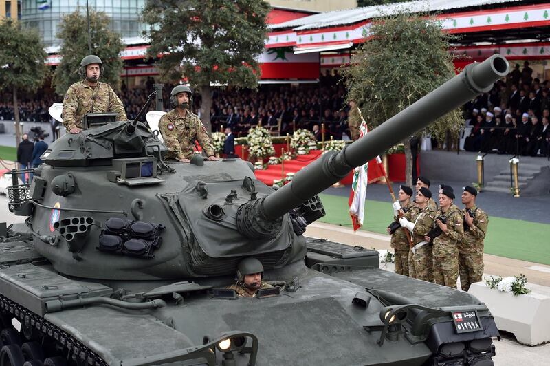 A tank battalion of the Lebanese army passes the presidential podium.  Wael Hamzeh / EPA