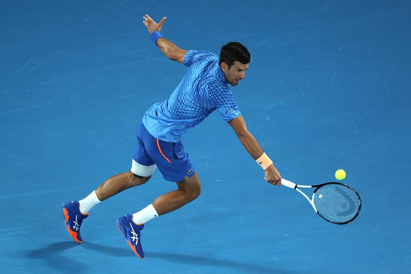 Novak Djokovic plays a backhand return. Getty