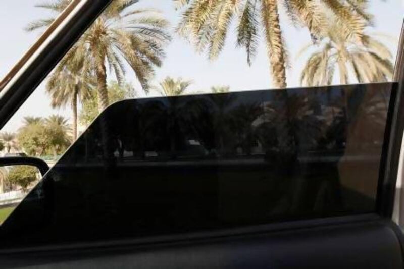 Abu Dhabi - October 8, 2009: A car window with 70 percent tint. ( Philip Cheung / The National )

 *** Local Caption *** ns10oc-70.jpg