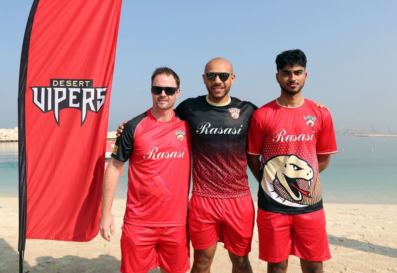 Desert Vipers captain Colin Munro with Tymal Mills, centre, and UAE Under-19 international Ali Naseer as they unveil the team's new jersey in Jebel Ali on Monday, January 9, 2023, ahead of the launch of the UAE's International League T20, which starts on Friday, January 13. All images: Chris Whiteoak / The National
