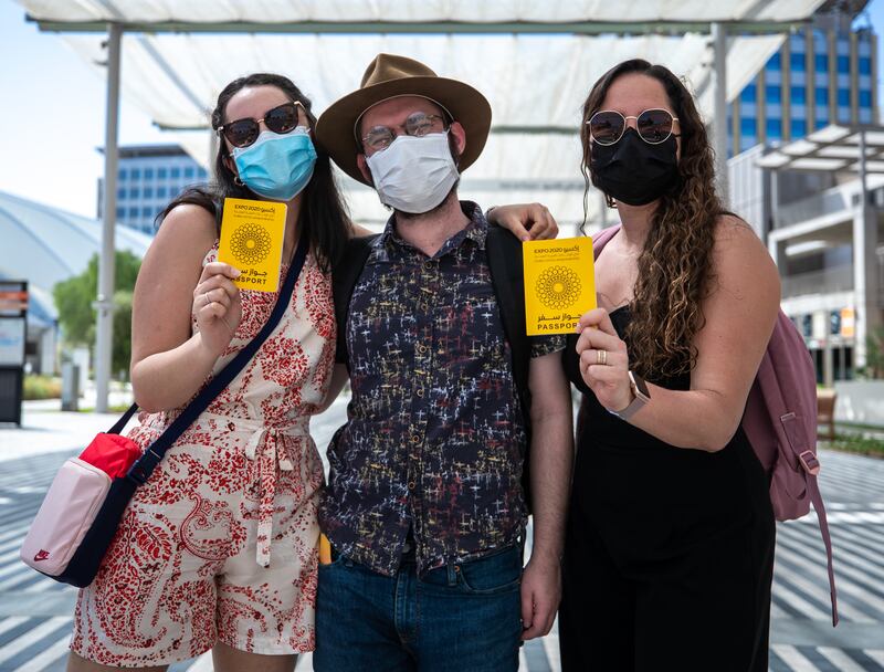 Visitors from Brazil, Karoline Silva, Matheus Brum and Flavia Roque at the Expo. Victor Besa/The National.