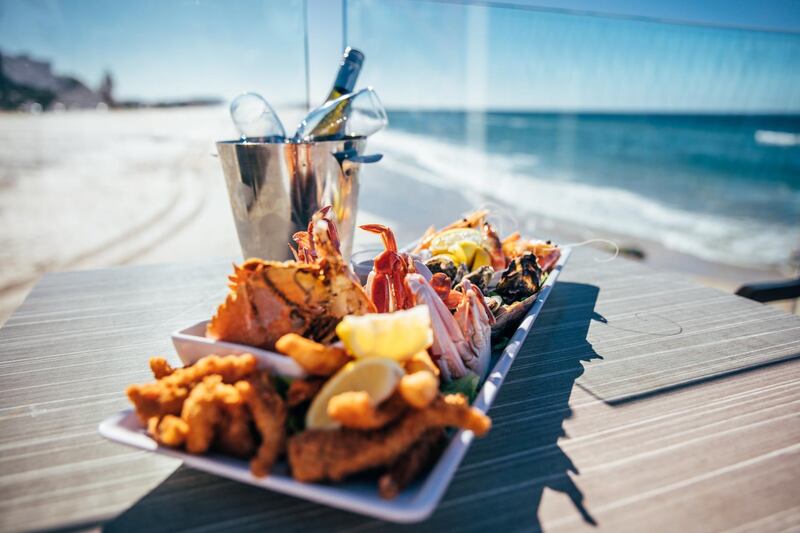 Currumbin Surf Lifesaving Club offers a seafood platter.  Gold Coast Tourism