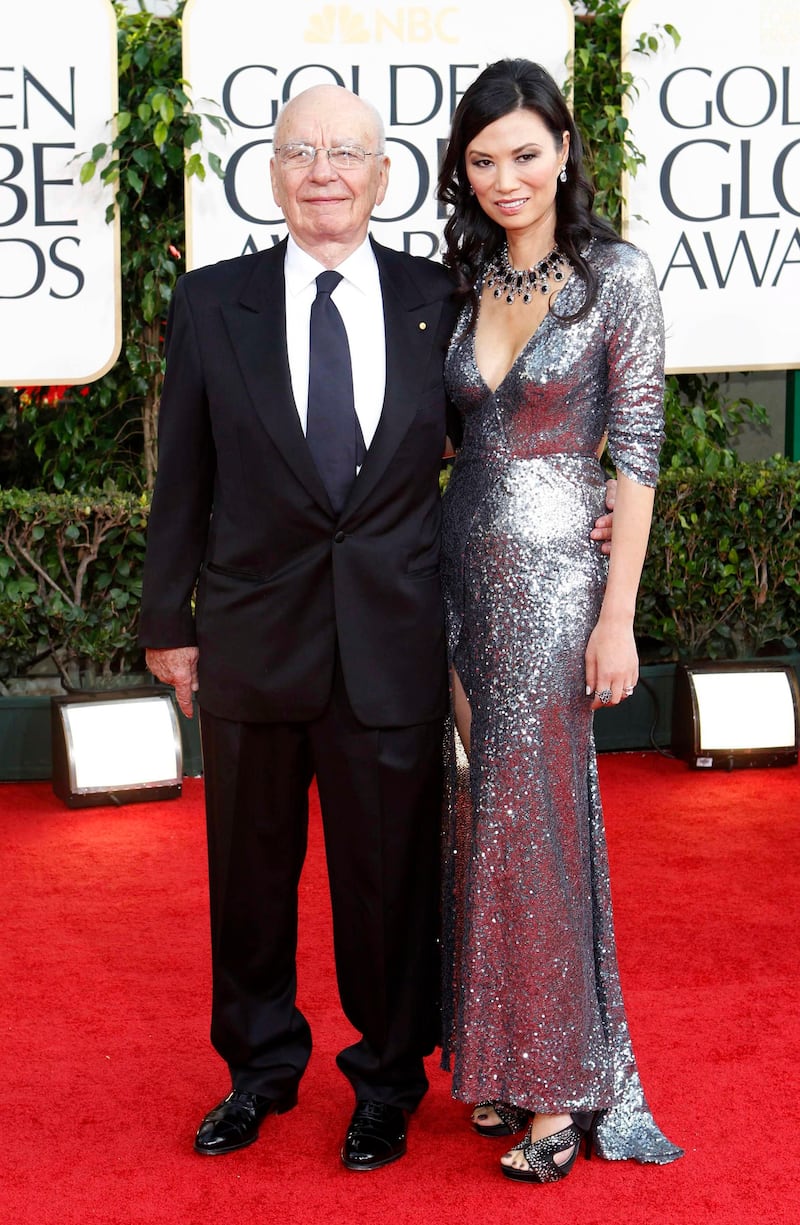 News Corp Chief Executive Rupert Murdoch and his wife Wendi Deng Murdoch arrive at the 68th annual Golden Globe Awards in Beverly Hills, California, January 16, 2011. REUTERS/Mario Anzuoni (UNITED STATES - Tags: ENTERTAINMENT MEDIA BUSINESS) (GOLDENGLOBES-ARRIVALS) *** Local Caption ***  BEV117_GOLDENGLOBES_0116_11.JPG