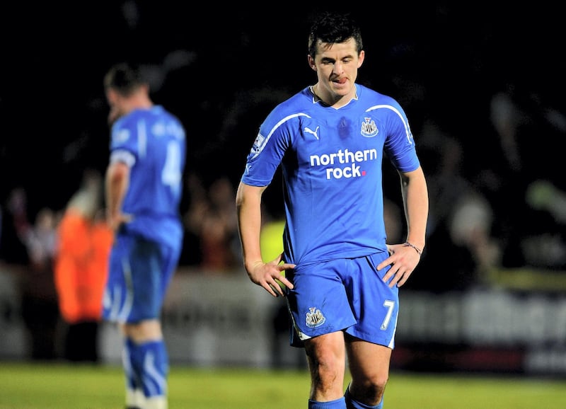 STEVENAGE, ENGLAND - JANUARY 08:  A dejected Joey Barton of Newcastle leaves the pitch following his team's 3-1 defeat during the FA Cup sponsored by E.ON 3rd round match between Stevenage and Newcastle United at the Lamex Stadium on January 8, 2011 in Stevenage, England.  (Photo by Michael Regan/Getty Images)