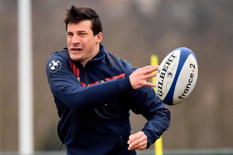 French rugby union national team fly-half Fran��ois Trinh-Duc practices during a training session ahead of the Six Nations match against England, on March 8, 2018, in Marcoussis. / AFP PHOTO / Christophe SIMON