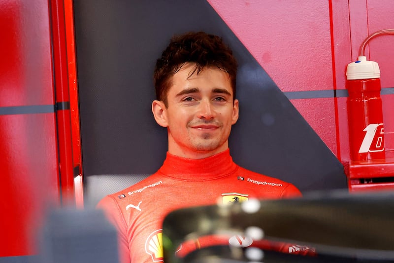 Ferrari's Monegasque driver Charles Leclerc takes rest in the garage during the third practice session at the Albert Park Circuit in Melbourne on April 9, 2022, ahead of the 2022 Formula One Australian Grand Prix.  (Photo by Con Chronis  /  AFP)  /  -- IMAGE RESTRICTED TO EDITORIAL USE - STRICTLY NO COMMERCIAL USE --
