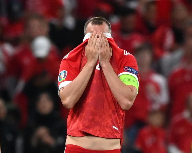 Russia's Artem Dzyuba looks dejected. Reuters