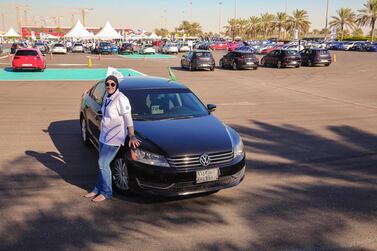 Ammal Farahat with her Volkswagen Passat, which she has only just registered under her own name. Courtesy Volkswagen.