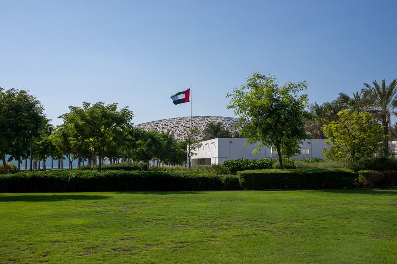 Families can picnic amid the Louvre Abu Dhabi grounds in January. Victor Besa / The National