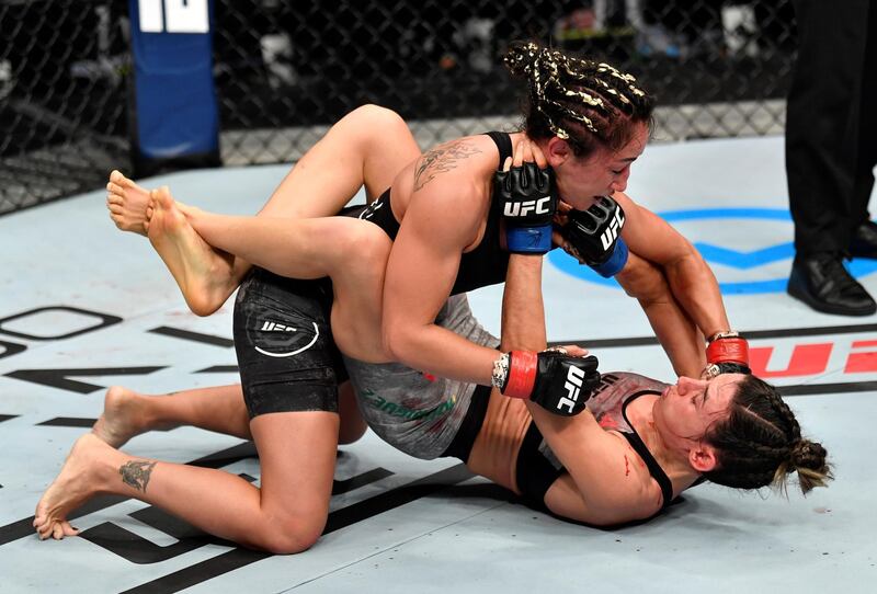 ABU DHABI, UNITED ARAB EMIRATES - JULY 26: (L-R) Carla Esparza punches Marina Rodriguez of Brazil in their strawweight fight during the UFC Fight Night event inside Flash Forum on UFC Fight Island on July 26, 2020 in Yas Island, Abu Dhabi, United Arab Emirates. (Photo by Jeff Bottari/Zuffa LLC via Getty Images)