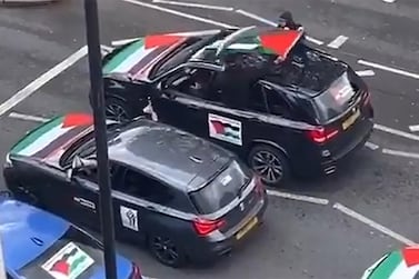 A convoy of vehicles travels through north London in solidarity with Palestinians. Twitter
